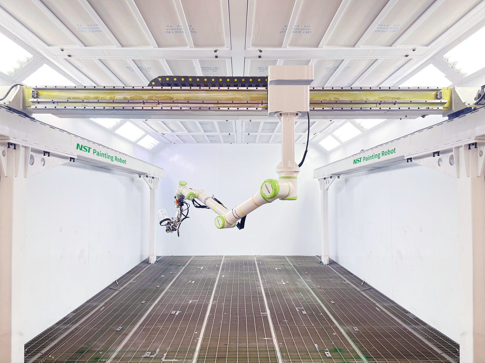 NST 9-axis painting robot inside the spray booth